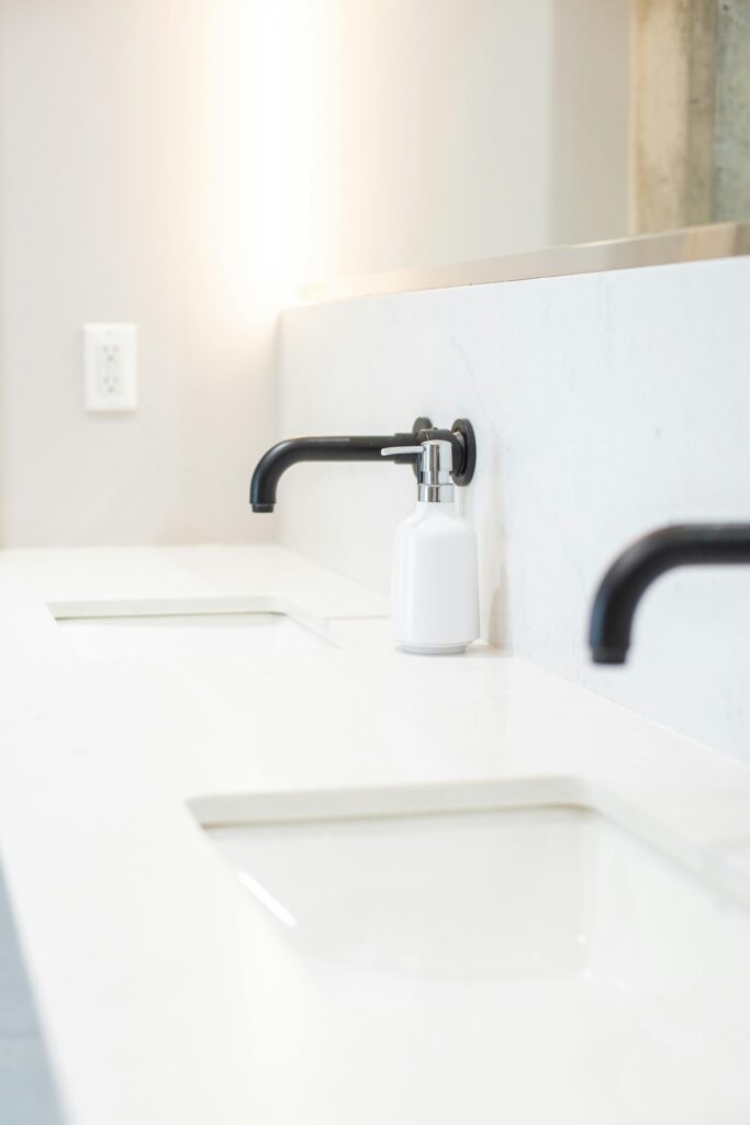 Free Photo Of Clean White Bathroom Sinks wall-mounted faucets picture